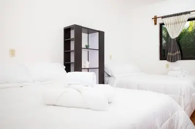 Cama o camas de una habitación en Casona San Germán - Alojamiento para 14 personas en Oaxaca