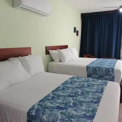 Cama o camas de una habitación en La Morada, una ventana al golfo - Hotel boutique