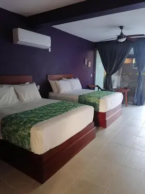 Cama o camas de una habitación en La Morada, una ventana al golfo - Hotel boutique