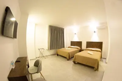 Cama o camas de una habitación en HOTEL REFORMA 14