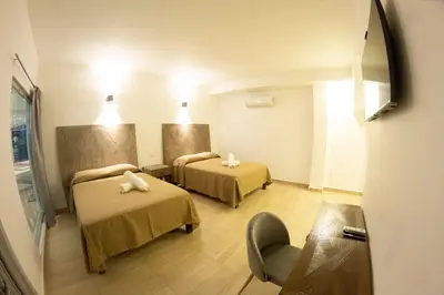 Cama o camas de una habitación en HOTEL REFORMA 14