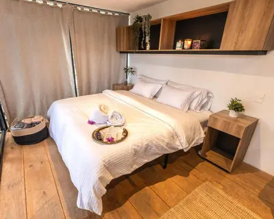 Cama o camas de una habitación en Fungi Tepoz Cabins