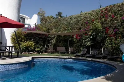 Piscina en o cerca de Casa las Maravillas, hermosos jardines y alberca