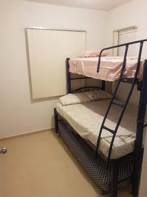 Cama o camas de una habitación en Descanso, Tranquilidad y Aventura en Acapulco