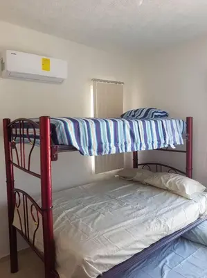 Cama o camas de una habitación en Descanso, Tranquilidad y Aventura en Acapulco