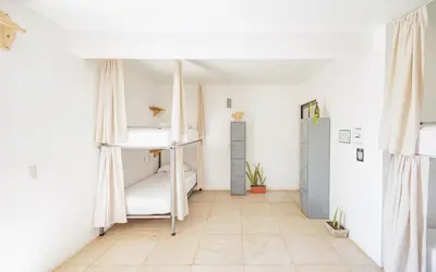Cama o camas de una habitación en SurfNest Tamarindos