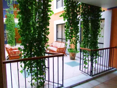 Un balcón o terraza de Hotel Oaxaca Dorado