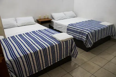 Cama o camas de una habitación en Hotel OM DownTown