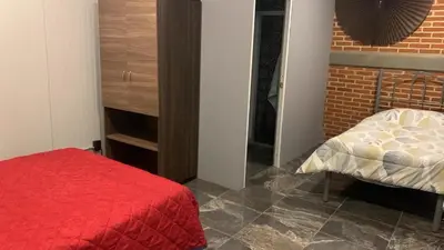 Cama o camas de una habitación en Suite Aries