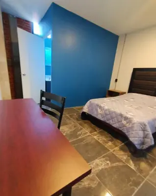 Cama o camas de una habitación en Suite Aries