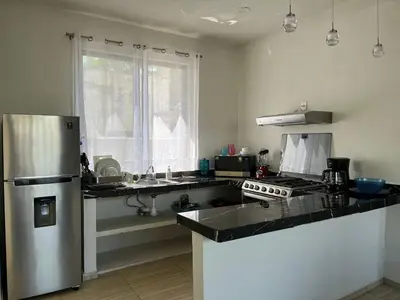Una cocina o zona de cocina en Departamento Marsopas a 5 minutos a pie de Bahía Carrizalillo!!! 6
