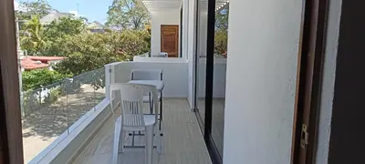 Un balcón o terraza de Departamento Marsopas a 5 minutos a pie de Bahía Carrizalillo!!! 5