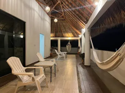 Zona de estar de Departamento Marsopas a 5 minutos a pie de Bahía Carrizalillo!!! 5