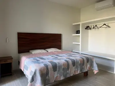 Cama o camas de una habitación en Departamento Marsopas a 5 minutos a pie de Bahía Carrizalillo!!! 1