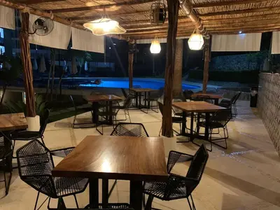 Un restaurante o sitio para comer en Departamento en Condominio Astoria