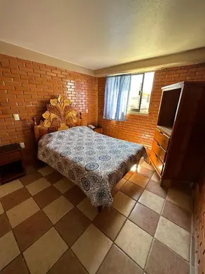 Cama o camas de una habitación en Hotel Villa Del Rey