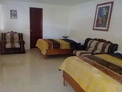 Cama o camas de una habitación en Cabañas del Coronel