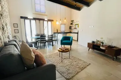 Zona de estar de Hermoso Loft en Valquirico, Lofts Frontana.
