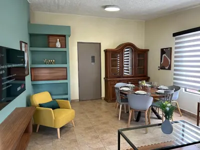 Una televisión o centro de entretenimiento en Xochimilco Apartment