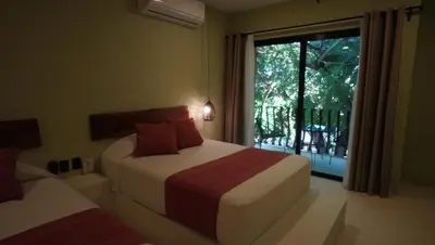 Cama o camas de una habitación en Hotel Bindani’