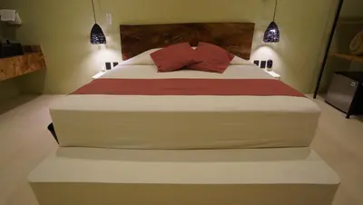 Cama o camas de una habitación en Hotel Bindani’