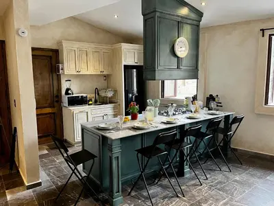 Una cocina o zona de cocina en Val'quirico Auguri Zócalo I, Depto 5 Camas