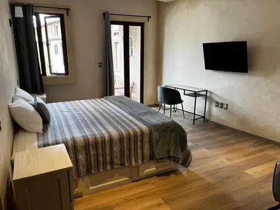 Cama o camas de una habitación en Val'quirico Auguri Zócalo I, Depto 5 Camas