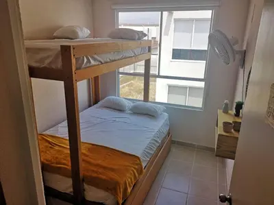 Cama o camas de una habitación en Dafi´s House (Exclusivo con jardín)