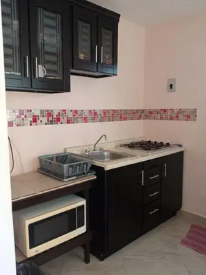 Una cocina o zona de cocina en Casa Confortable