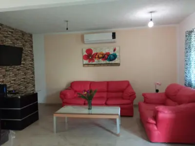 Zona de estar de Casa Confortable