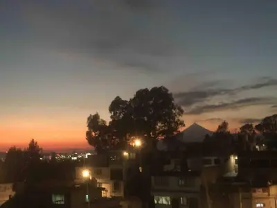 Amanecer o atardecer desde la habitación en casa particular o alrededores