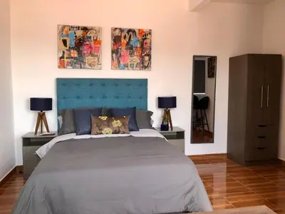 Cama o camas de una habitación en Departamento Zeus 12
