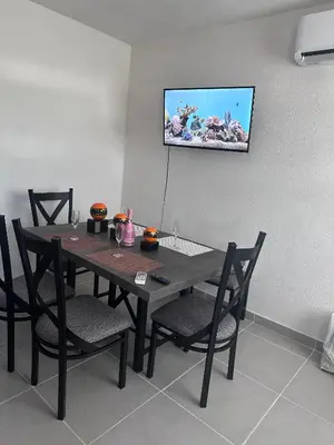 Una televisión o centro de entretenimiento en Casa Acapulco de mis amores Diamante